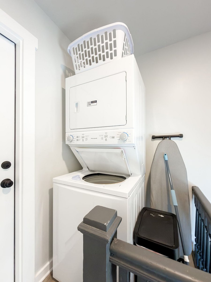 Stackable washer/dryer combo with ironing board