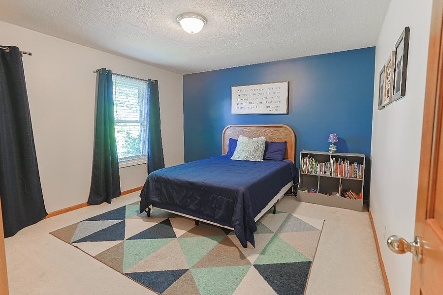 Guest Bedroom #3 shown with queen bed