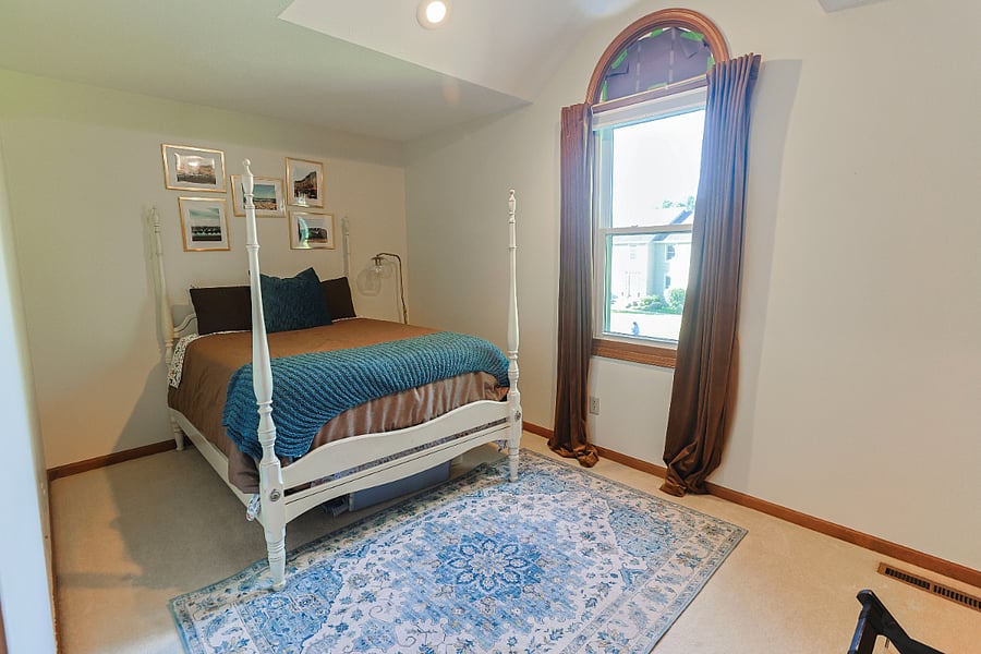 Guest bedroom #1 shown with full size bed 