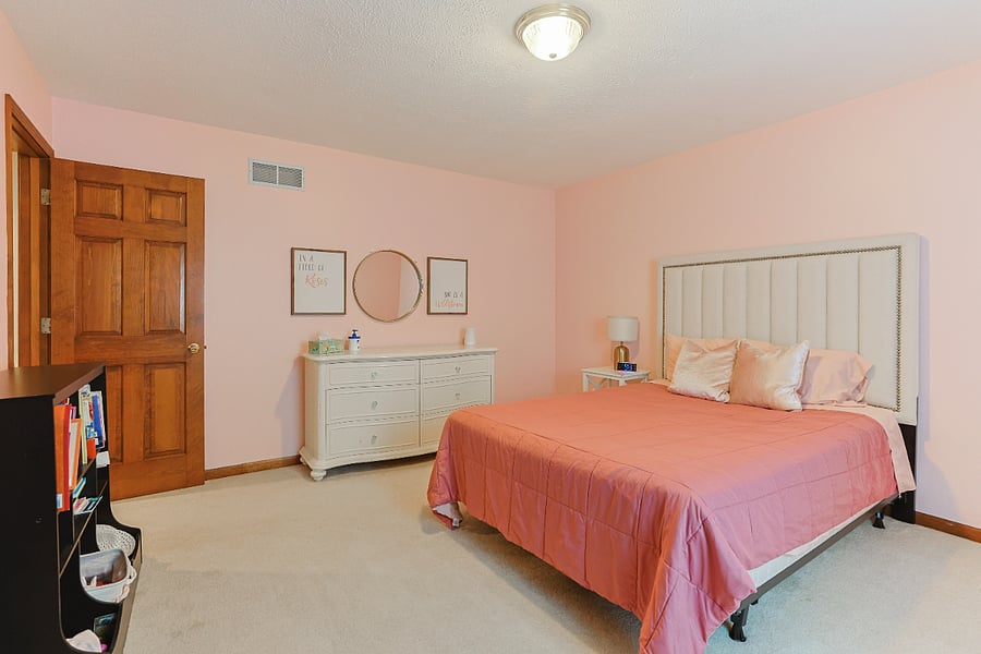 Guest Bedroom #2 shown with queen bed