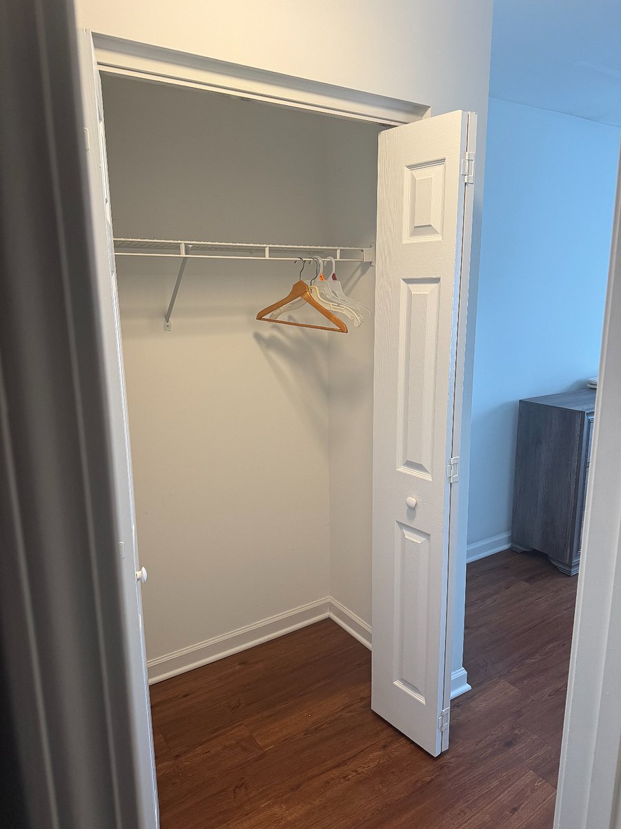 Large master bedroom closet with shelving (2/2)
