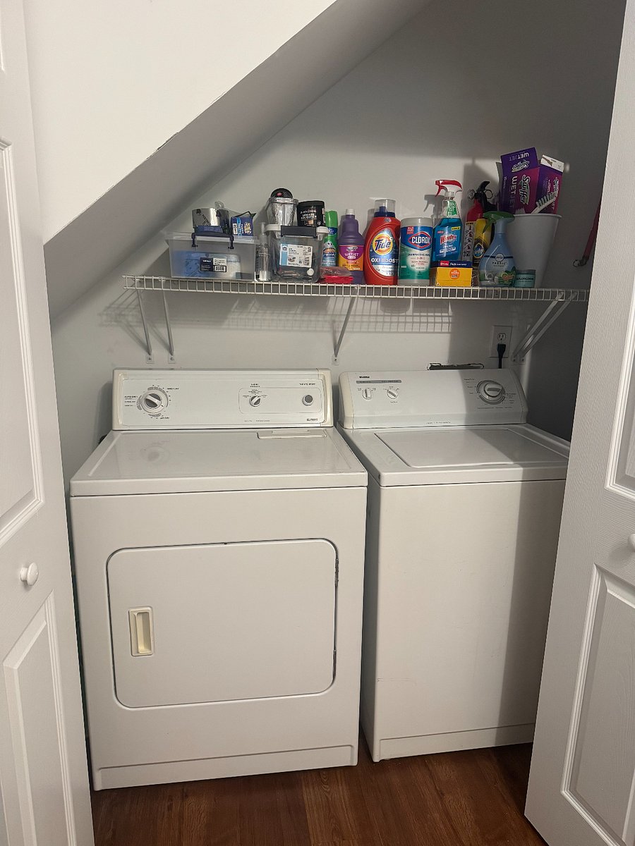 Shared laundry room with shared supplies