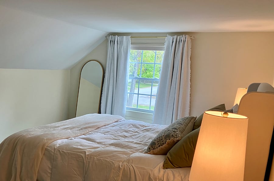 Primary BR with queen bed and blackout drapes