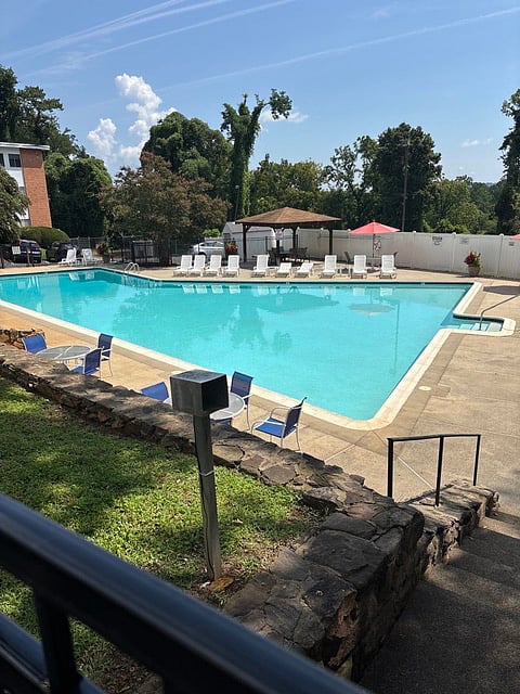 well-maintained pool area, gated for Residents and their guests to use