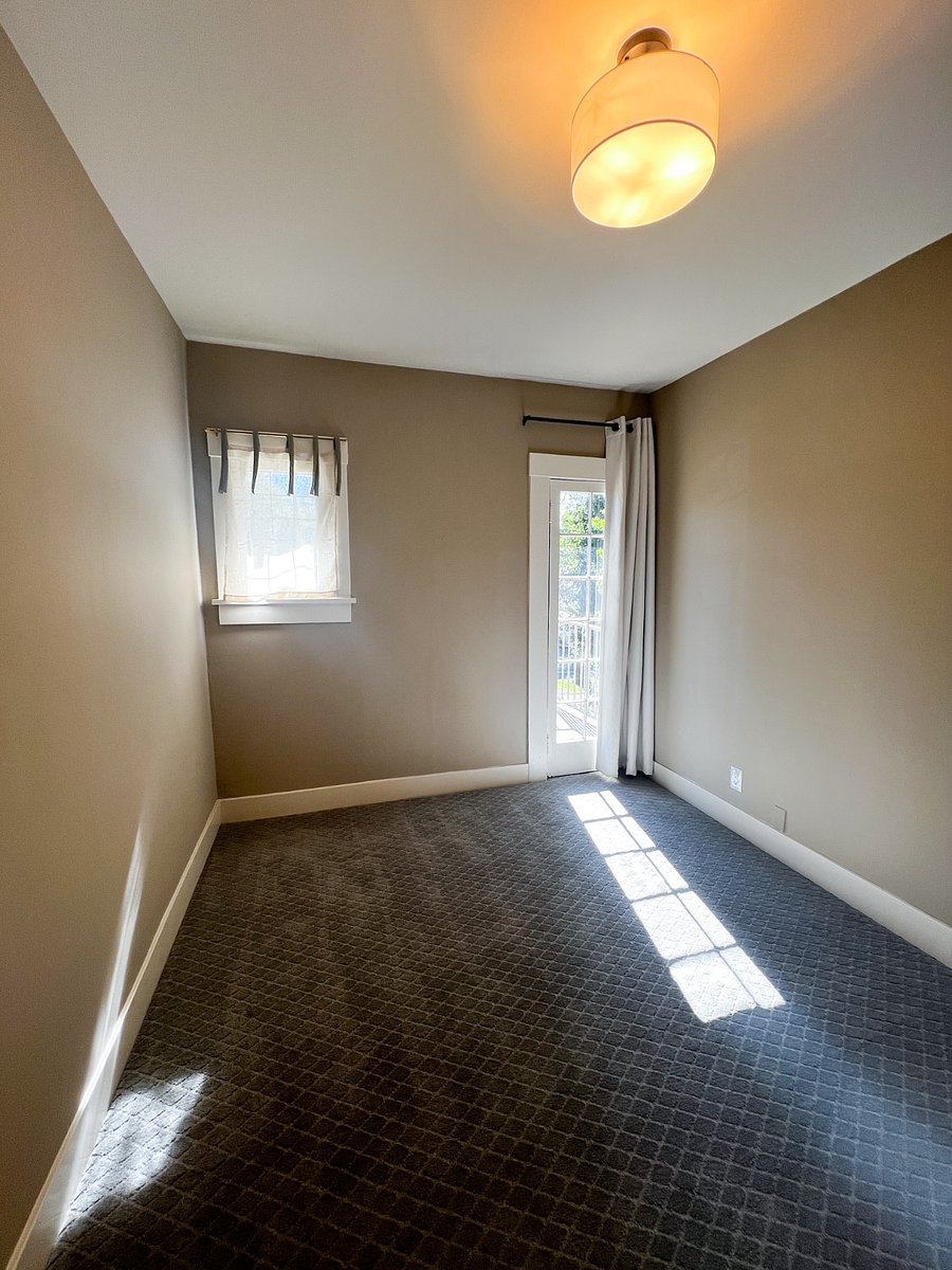 Den with access to large balcony on 2F