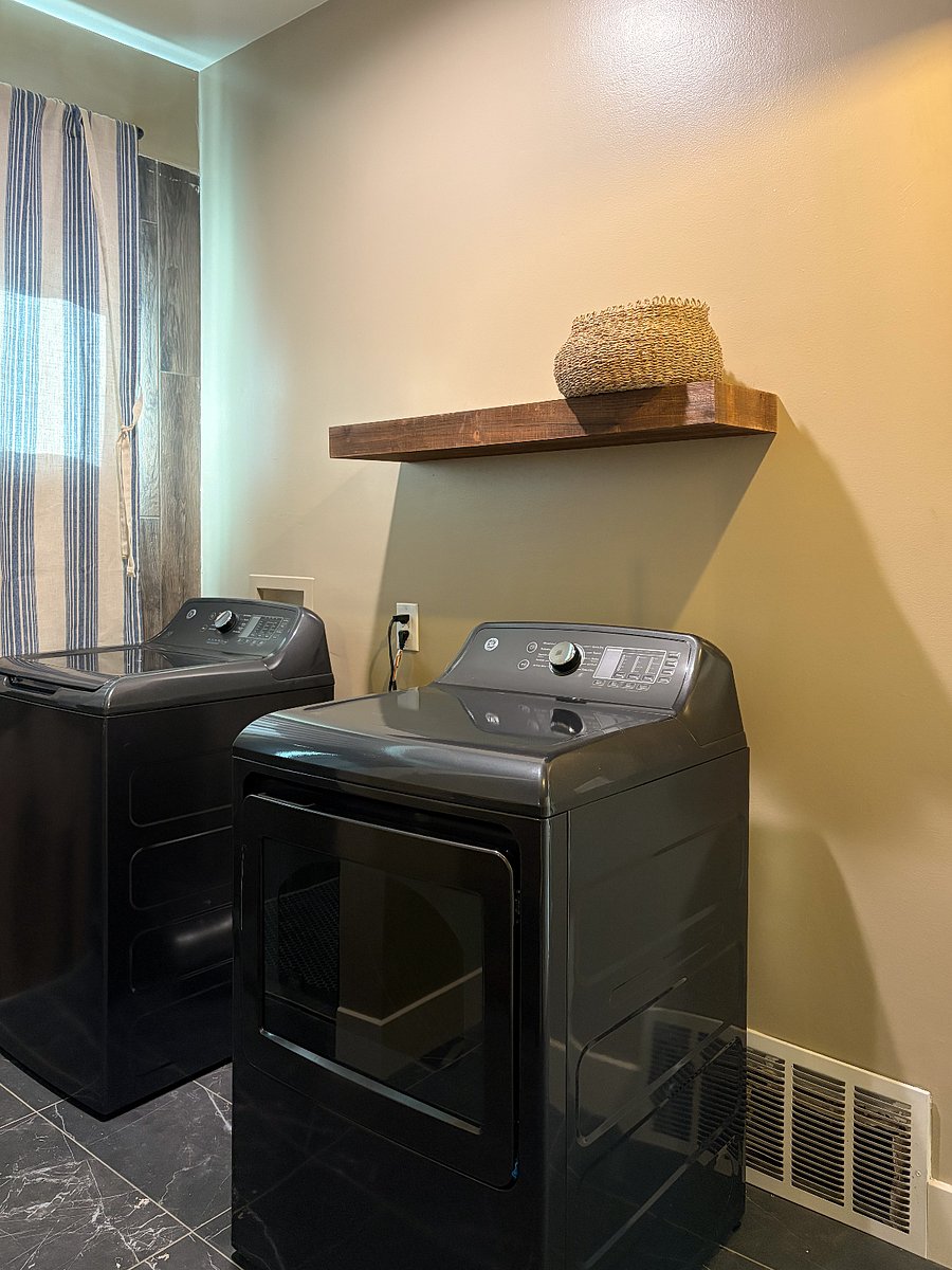 1st floor full bath with laundry machine and dryer