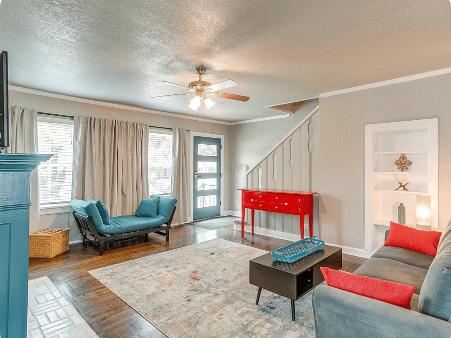 Bright main living room with fireplace and Fire TV  1st floor