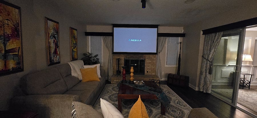 Living/family room area and projector screen opened