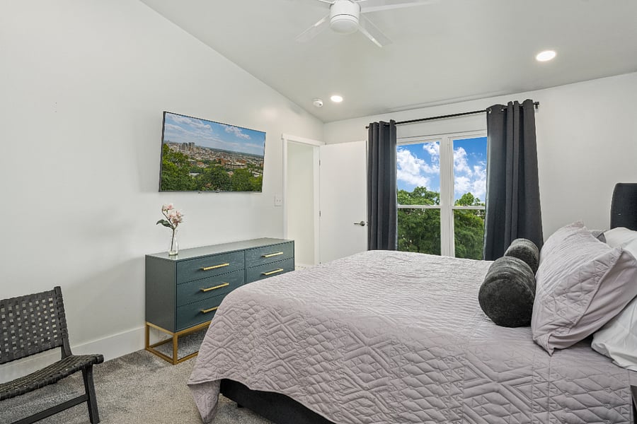 Master Bedroom View with 55" Smart TV & Dresser