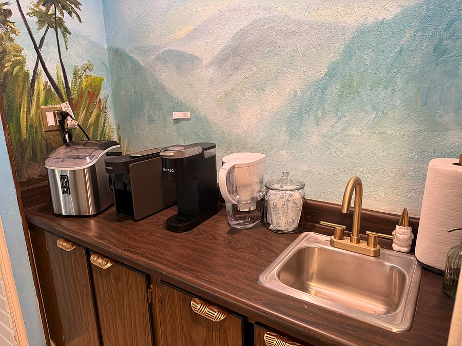 Bring your own coffee appliance to the wet bar area, brita, ice maker and sink are awaiting you.