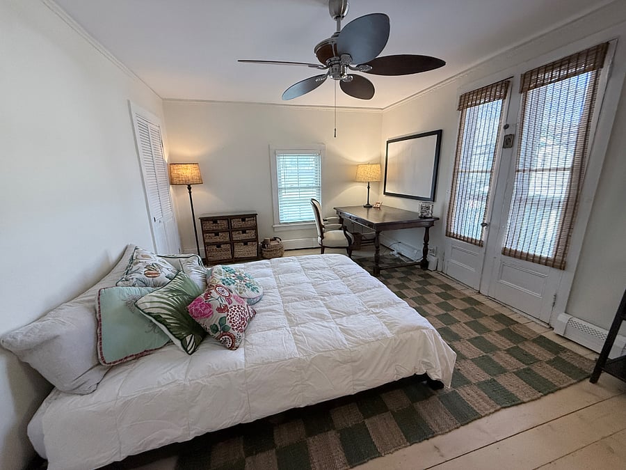 Wellness room with dresser, full closet and lots of hangers