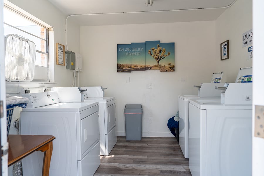 two shared coin operated washers and dryers