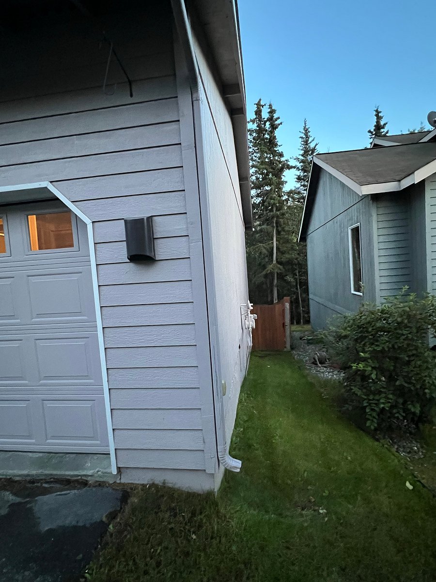 Outside: If you really wanted to, you could go in through this separate entrance through the gate, into the backyard, and through the sliding door. But that would be crazy in the snow, so don't do that.