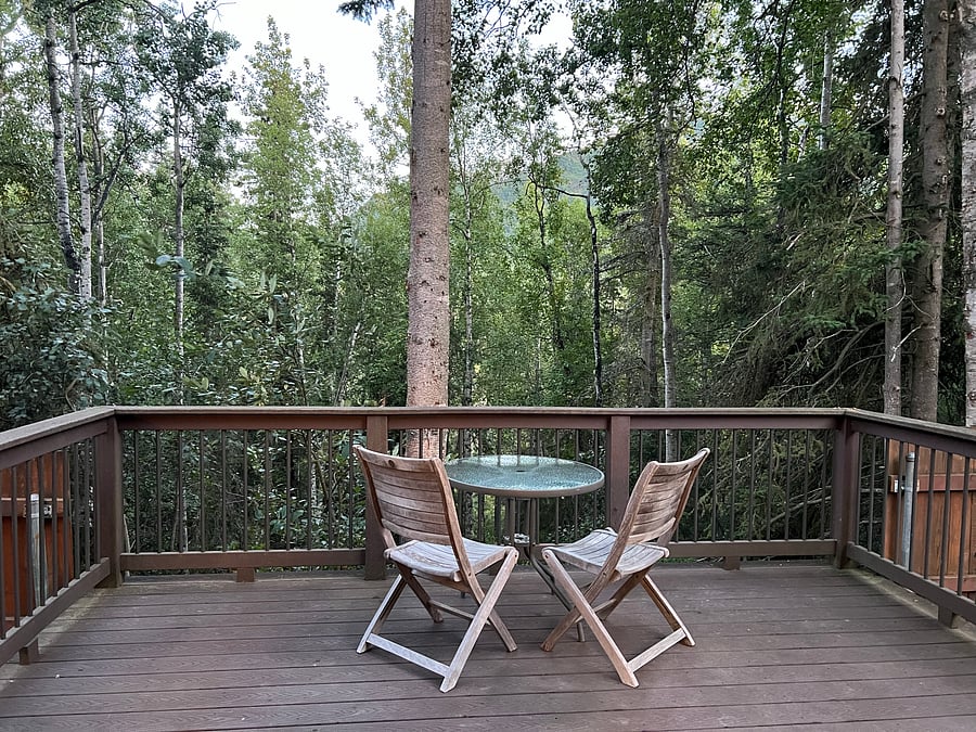 Outside: This is your porch, where you can shiver (winter is coming!) and enjoy the pretty woods.