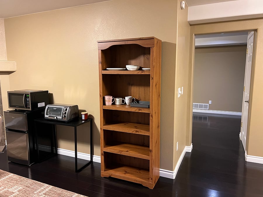 Basement: Mini-kitchen with mini-fridge/freezer, microwave, toaster oven, mugs, dishes, utensils (you can use our kitchen on the first floor anytime)