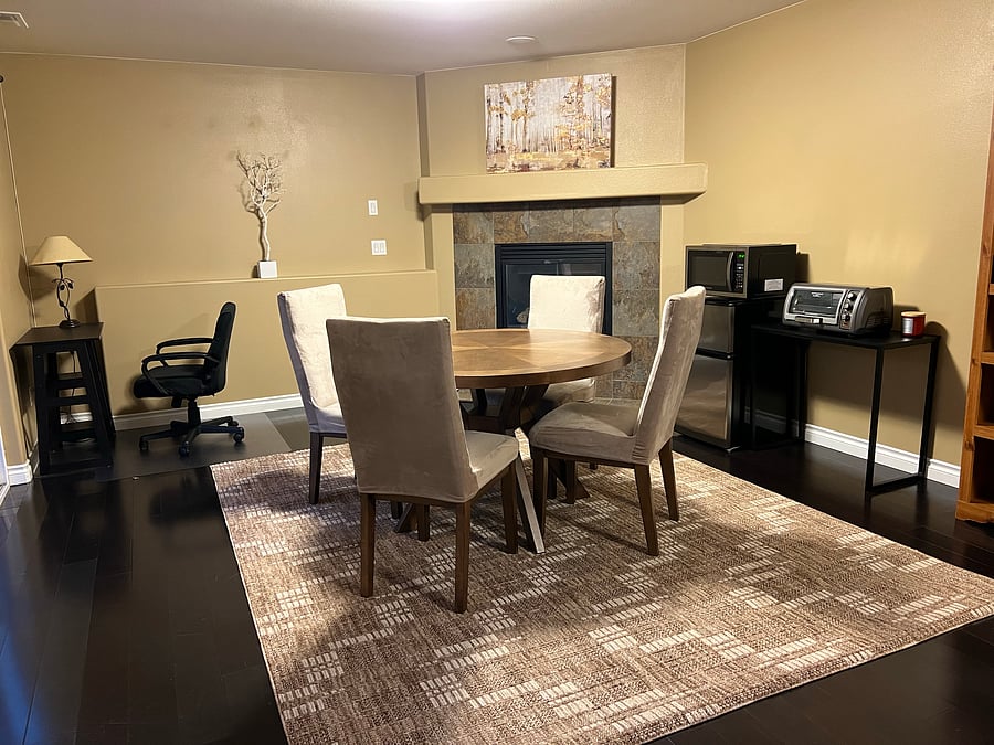 Basement: Your spacious dining area. And tiny study area. And gas fireplace, yay! :)