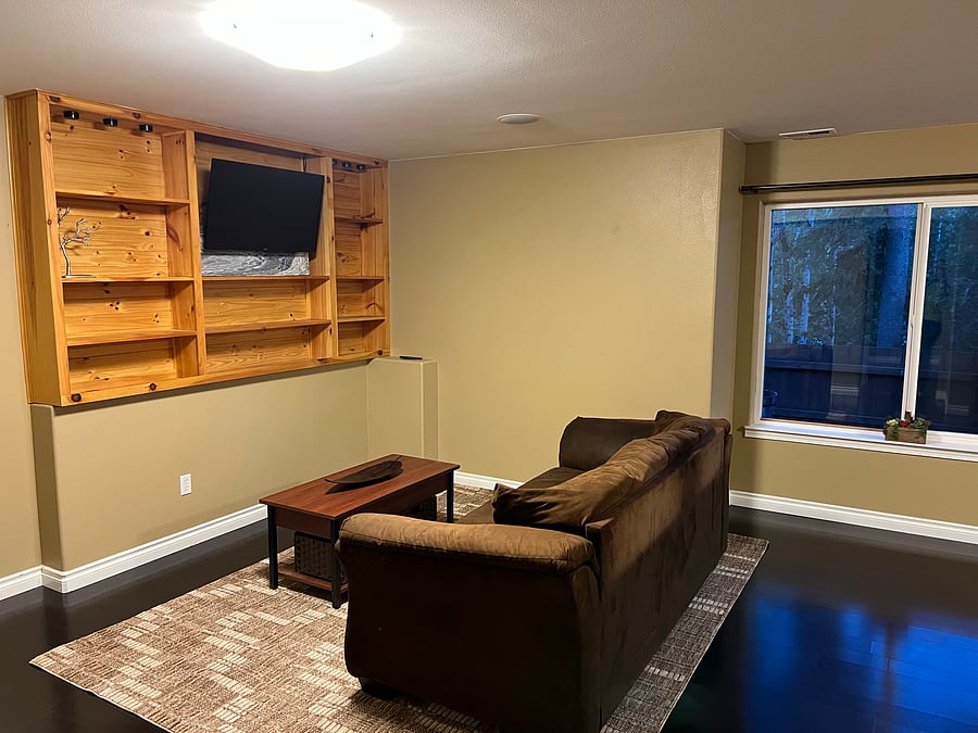 Basement: Your living room with a 40" smart TV and comfy couch