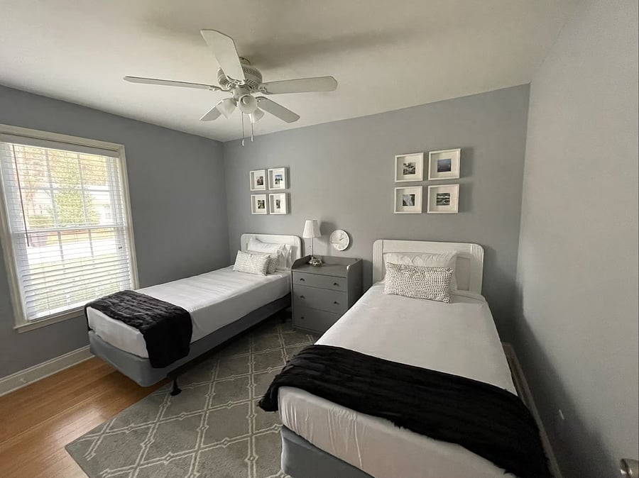 Bedroom 3 has two twin beds, closet, and dresser