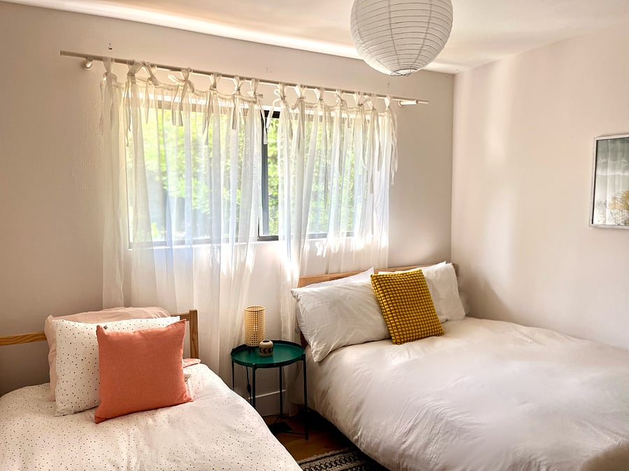 Third bedroom with one full-size bed and new twin bed.