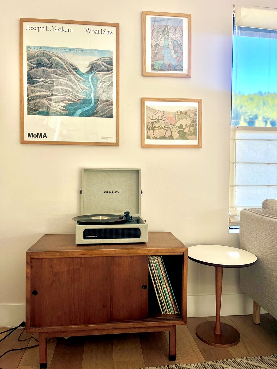 Record player with classic records that span the decades.