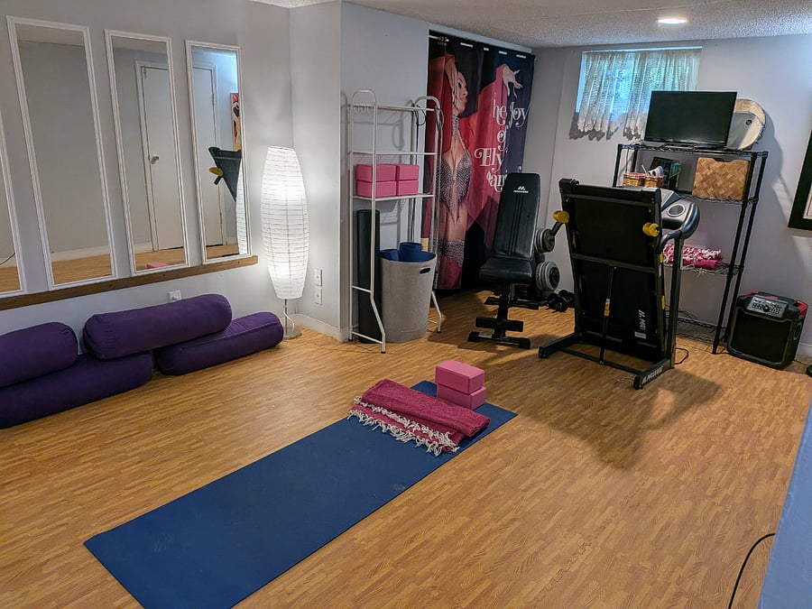 Yoga space (treadmill folded up)
