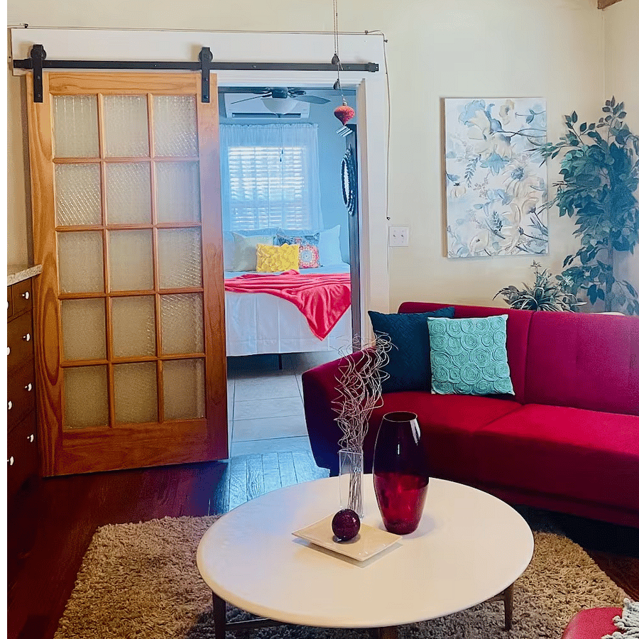 Barn doors on the two bedroom exits offer privacy while saving space.