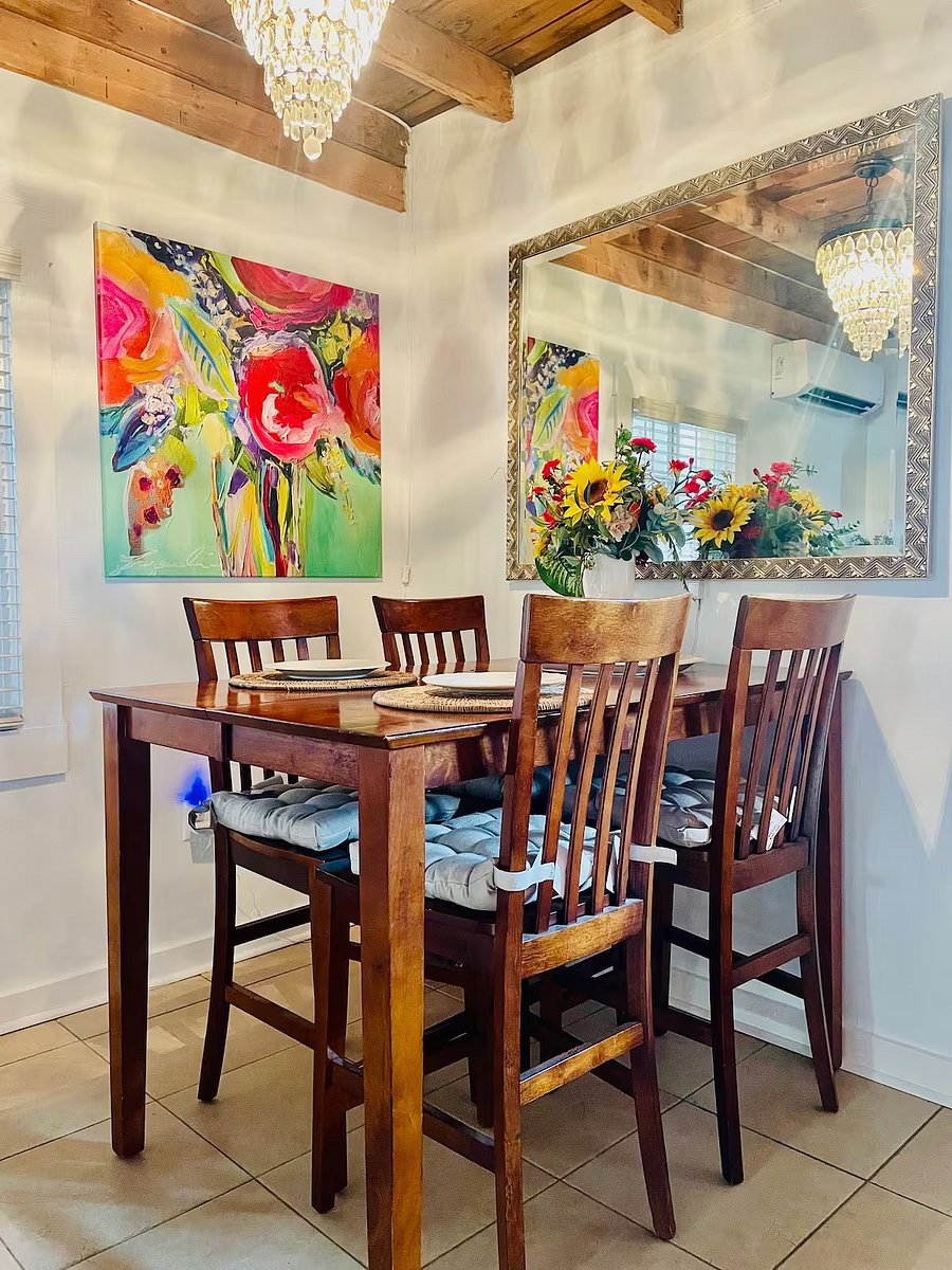 Counter top height dining room table that seats four.  