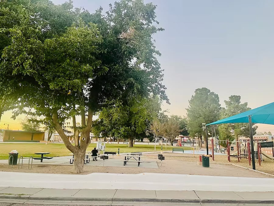 The neighborhood park is directly outside the adobe's front door and offers picnic/charcoal grilling areas, outdoor basketball, community-based events and a child-friendly playground.