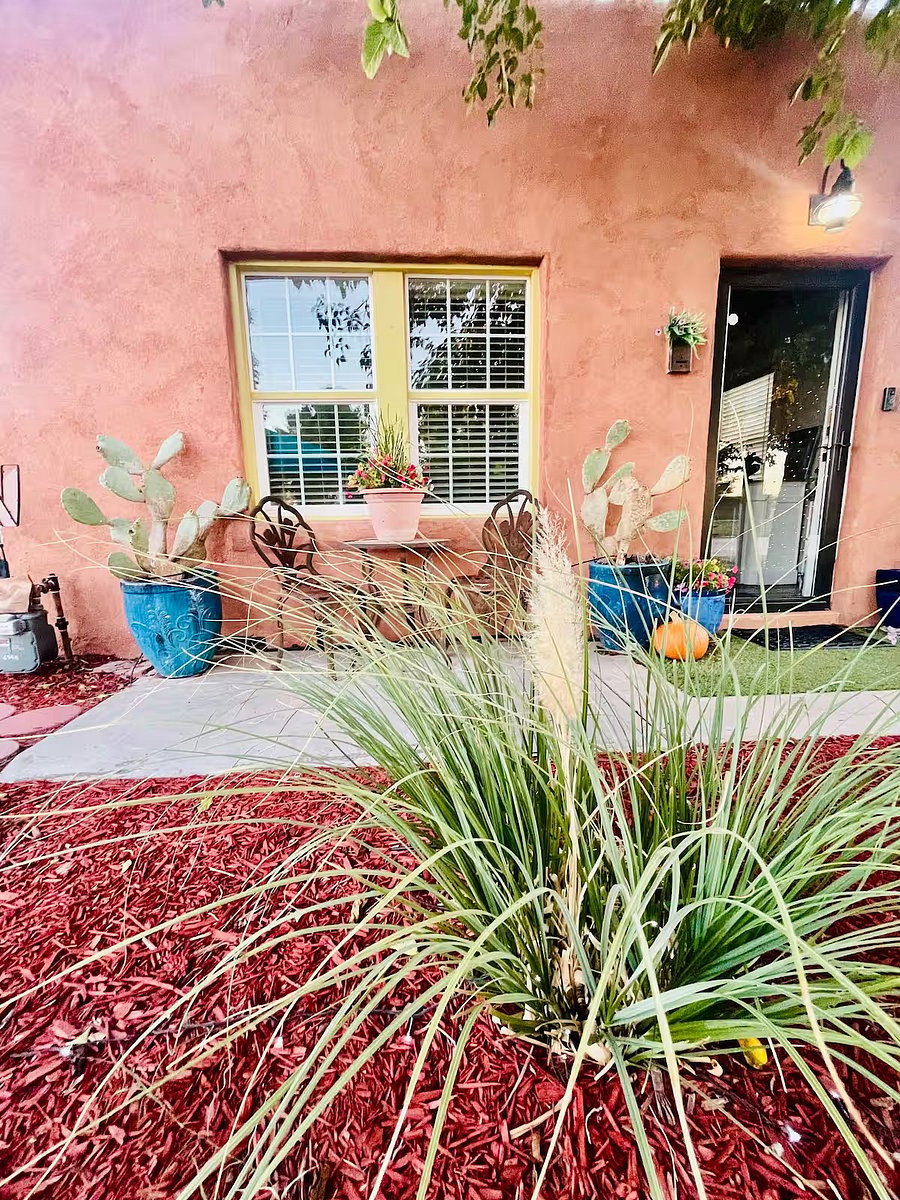 Front entrance has a full-view glass security door in addition to a wooden door to ensure safety and offer a view of the neighborhood park across the street.