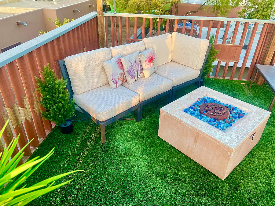 Rooftop terrace with outdoor seating.