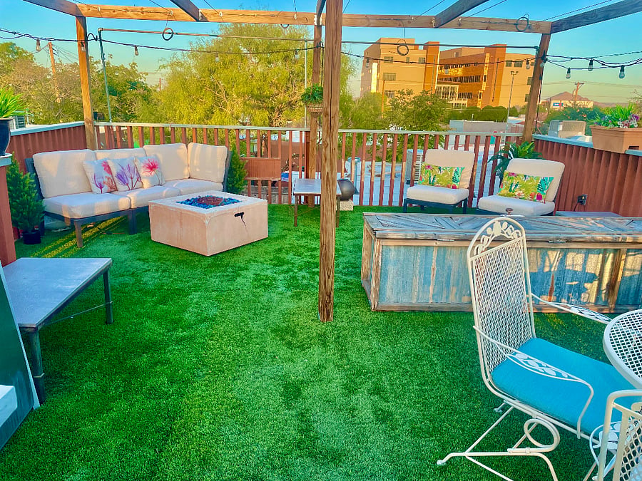 Rooftop terrace with outdoor seating.
