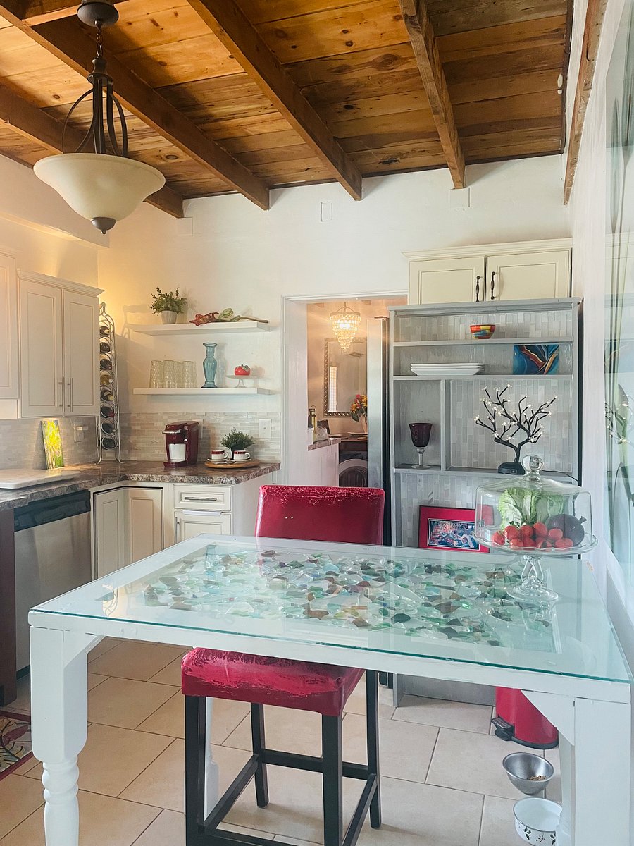An extra table in the kitchen provides additional counter space, an additional dining area or a work space when working remotely.