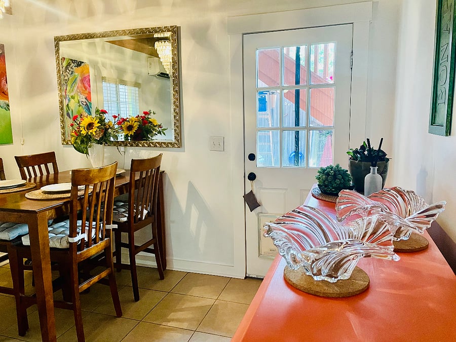 Exterior exit off the dining room is fitted with a medium-sized doggie door.