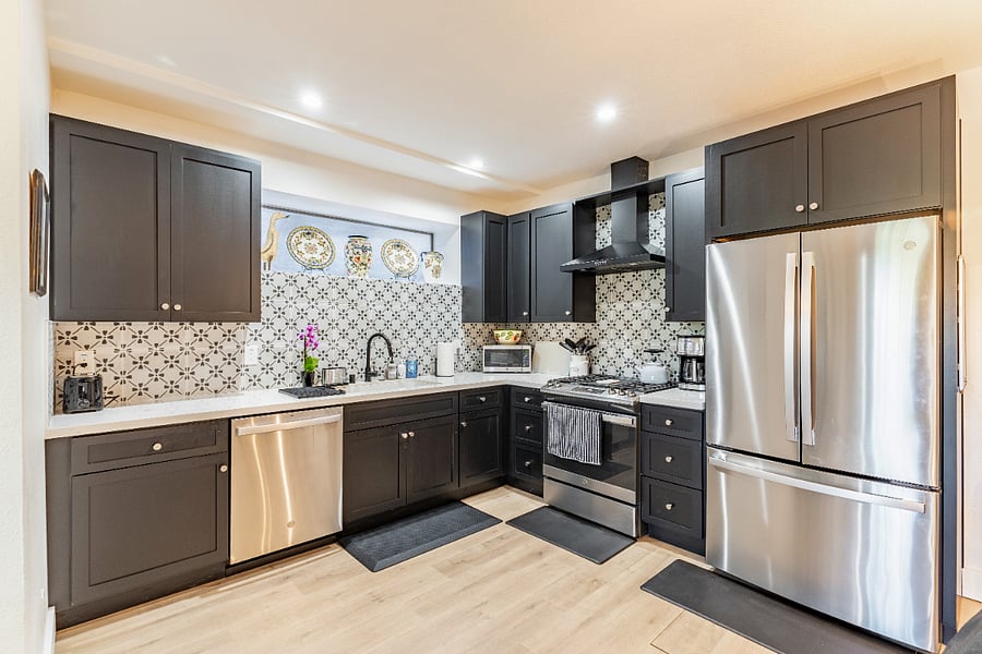 Fully-stocked kitchen includes all the essentials to enjoy a home cooked meal.