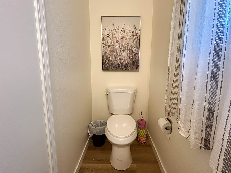 Half bath off den.
