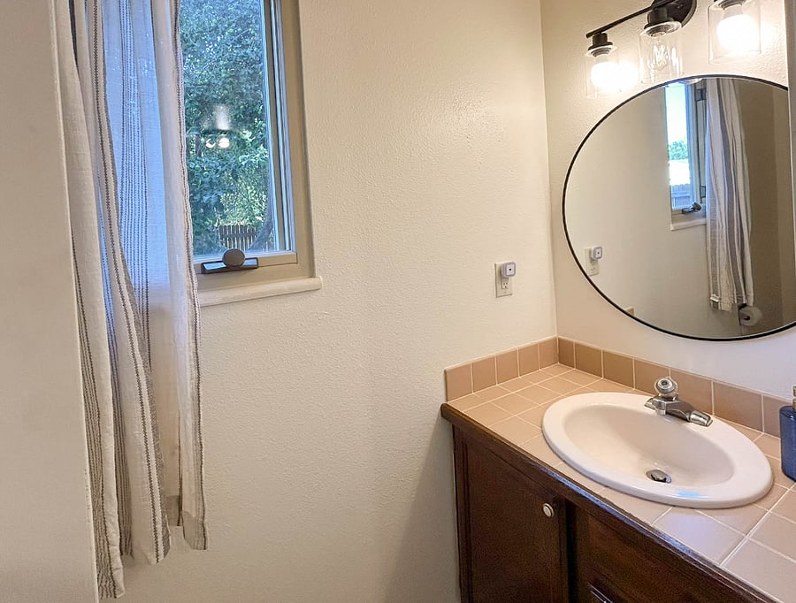 Half bath off den.