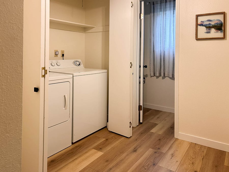 Laundry and hallway for hanging coats/backpacks. Entry to garage here.