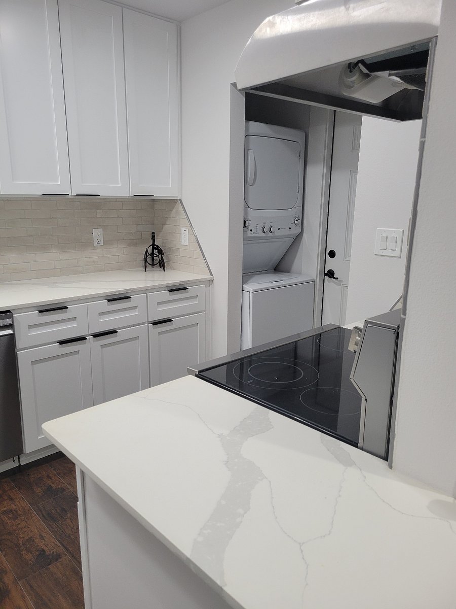 Kitchen with washer/dryer and added storage