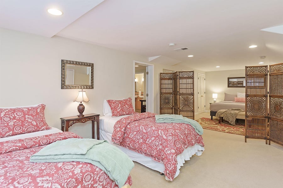 Bedroom #3 -
**Large downstairs suite with a king bed & two twin beds off of downstairs living room**
