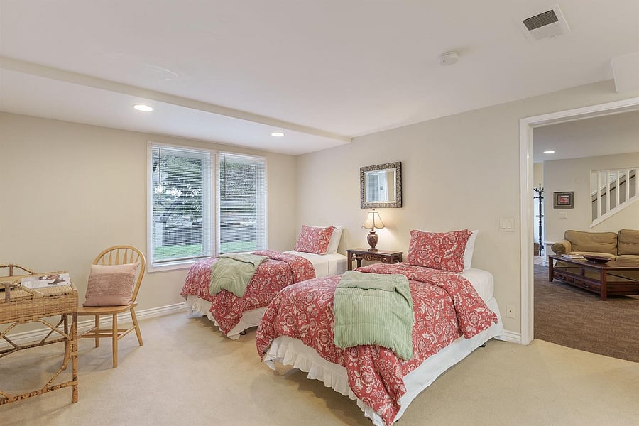 Bedroom #3 -
**Large downstairs suite with a king bed & two twin beds off of downstairs living room**