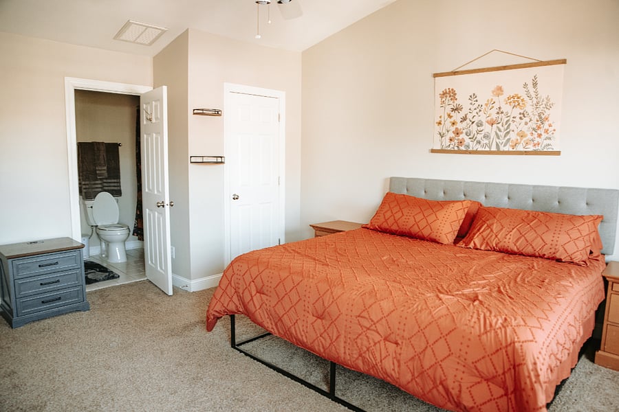 Upstairs Master Bedroom. King sized bed, two closets. Private bathroom attached.