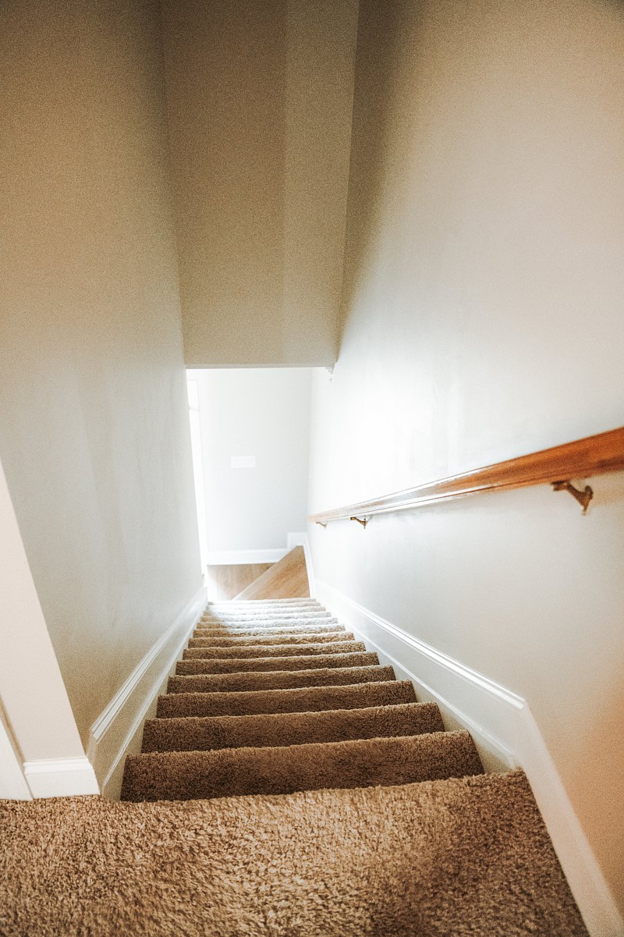 Stairs to go up to bedrooms and 2 full baths.