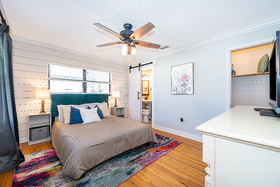 Primary bedroom with a queen bed