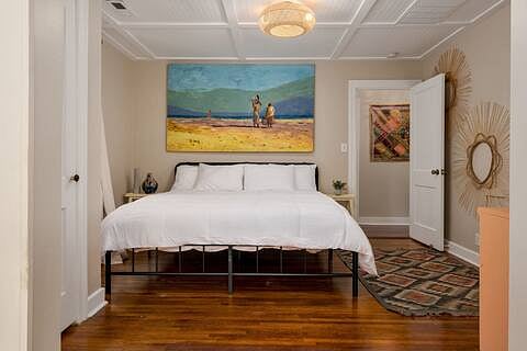 King bed in master bedroom with bath ensuite