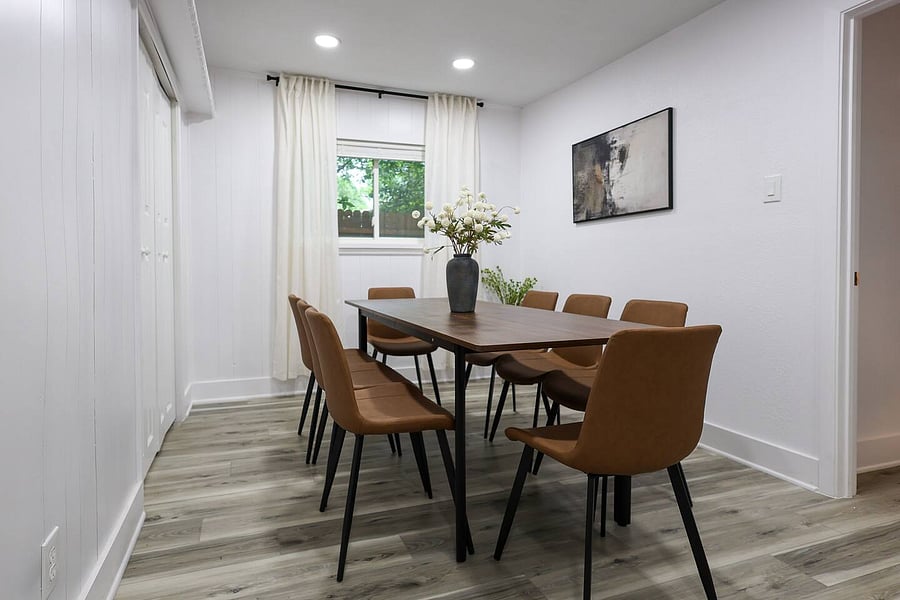 Spacious dining table with seating for 8-perfect for meals, games, and time together.