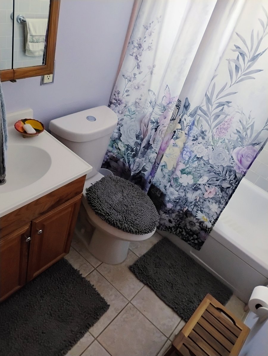 Another view of your private 1/2 bath with shared shower.