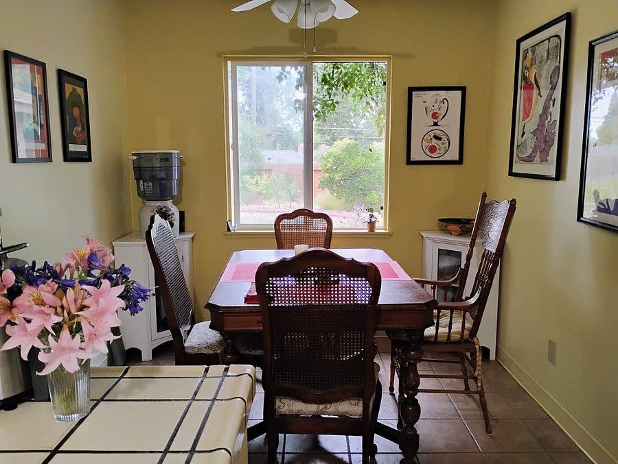 Dining area with backyard viewing window.