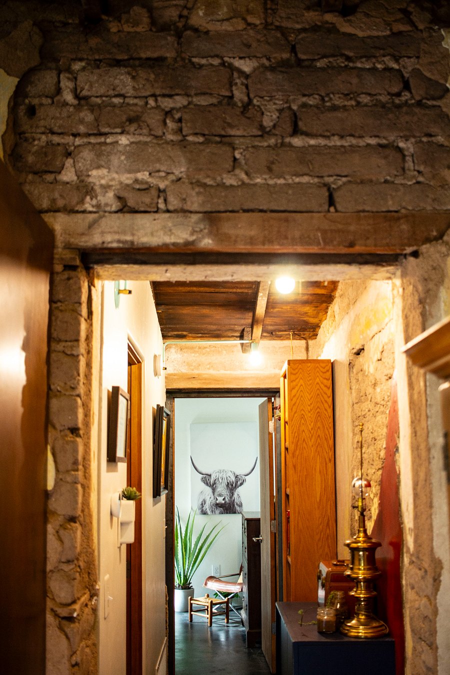 ORIGINAL ADOBE WALLS AND EXPOSED WOOD-BEAM CEILING