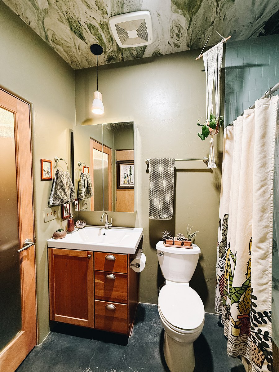 BATHROOM WITH TUB/SHOWER AND GENEROUS VANITY STORAGE