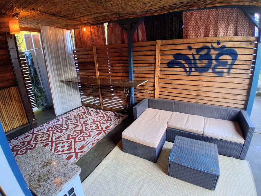 Private patio with seating and copper counter space.
